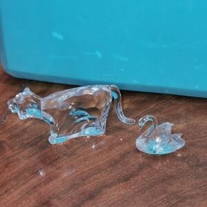 2 Swarovski figurines retired